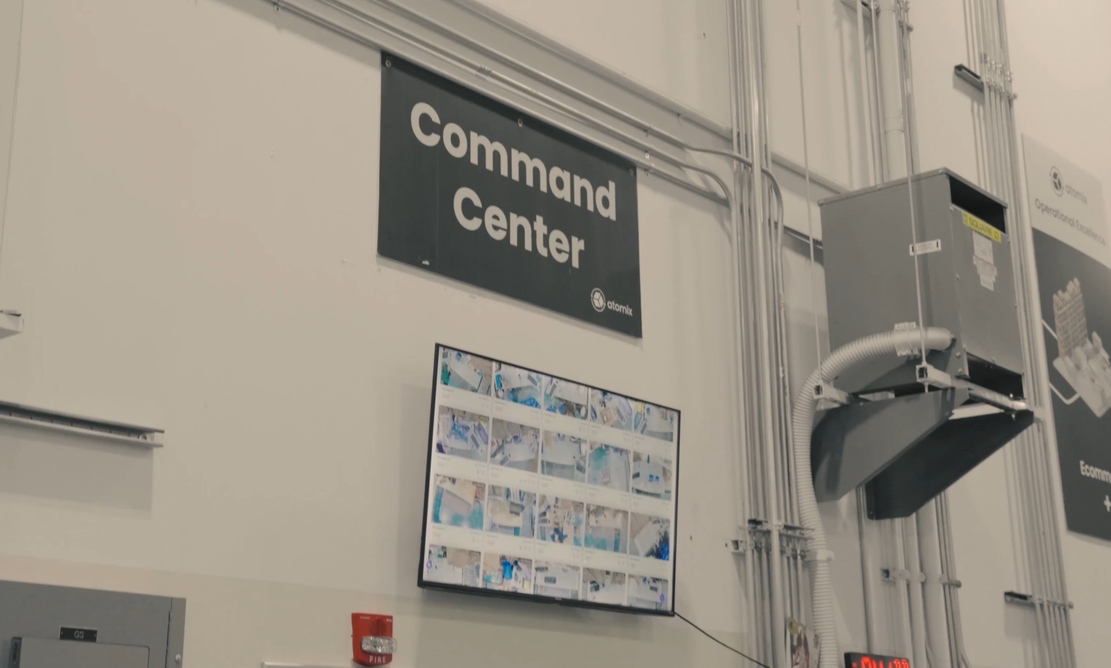 Atomix Command Center dashboard wall on the pack floor