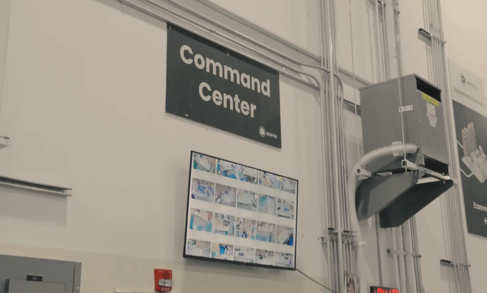 Atomix Command Center dashboard wall on the pack floor